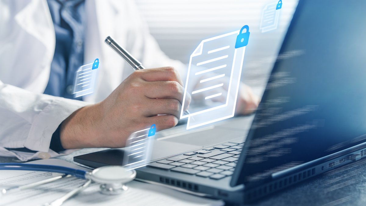 Doctor securing patient data on laptop with Microsoft 365